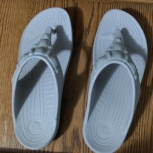 Light gray flip flops
